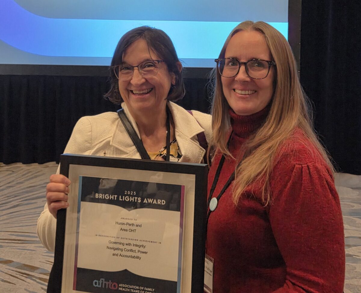 Barb Major-McEwan (Executive Director, Clinton Family Health Team) and Robin Spence Haffner (Executive Director, Listowel-Wingham &amp; Area Family Health Team) accepting the AFHTO Bright Lights Award for the HPA-OHT Accreditation Collaborative.